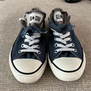 Woman’s double tongue converse